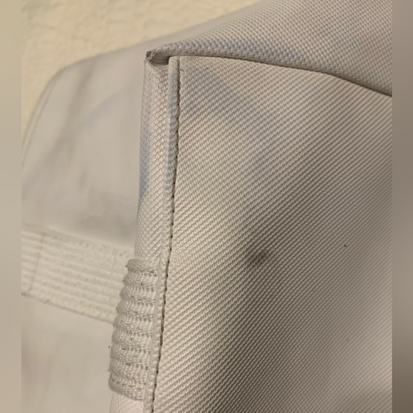 Lacoste OffWhite Large PreOwned Tote Bag inside clean outside blue light stains. - Picture 16 of 16